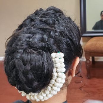 Looks by Jassi - Jassi did a beautiful complex bun on us for the wedding. - Makeup Artists Near Me