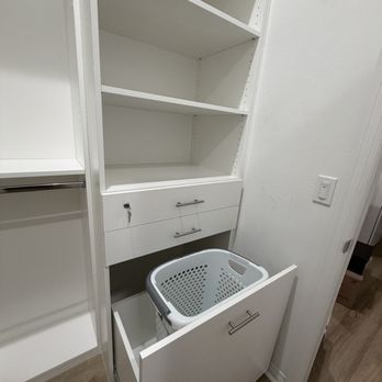 Source Cabinetry - Pull out laundry hamper with easily removable basket in the master bedroom closet... - Cabinetry Near Me - Chiriaco Summit, California Source Cabinetry - Pull out laundry hamper with easily removable basket in the master bedroom closet... - Cabinetry Near Me - Chiriaco Summit, California