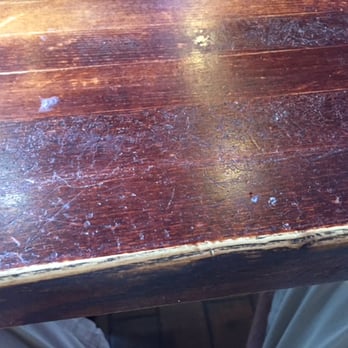 La Cazuela - VERY Sticky, run-down, awful table where we sat (there is a theme to the run-down furniture) -- La Cazuela in downtown Lawrenceville - Mexican Near Me - Lawrenceville, Georgia