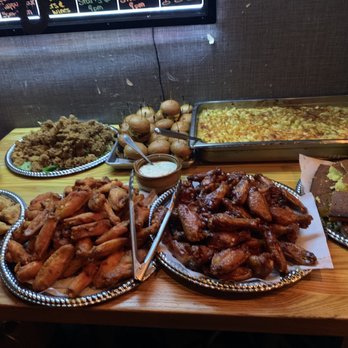 The Stewed Cow - Southern Fried Squid, Beef Silders, Mac & Cheese, Pulled Pork Empanadas, Buffalo Wings, Bourbon Glazed Wings, Corn Bread - Cocktail Bars Near Me - Hoboken, New Jersey