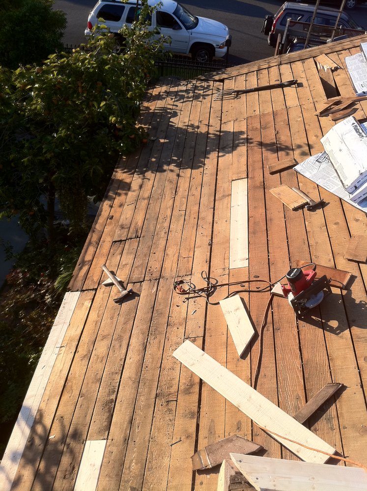 Slide of The Local Friendly Roofer