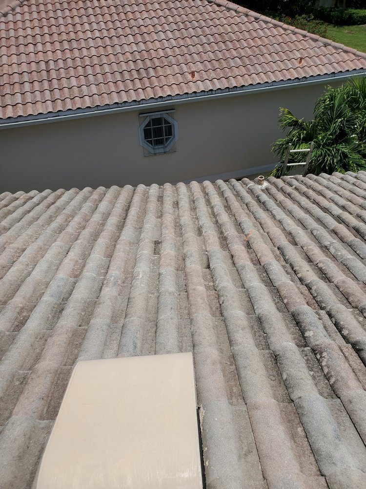Slide of Rip Tide Roofing
