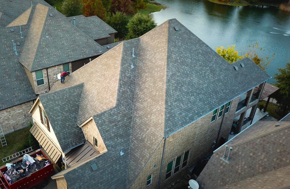 Slide of Osman Roofing Company