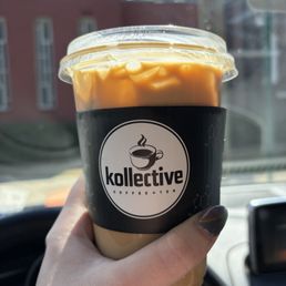 Large iced lavender honey latte in a to-go cup