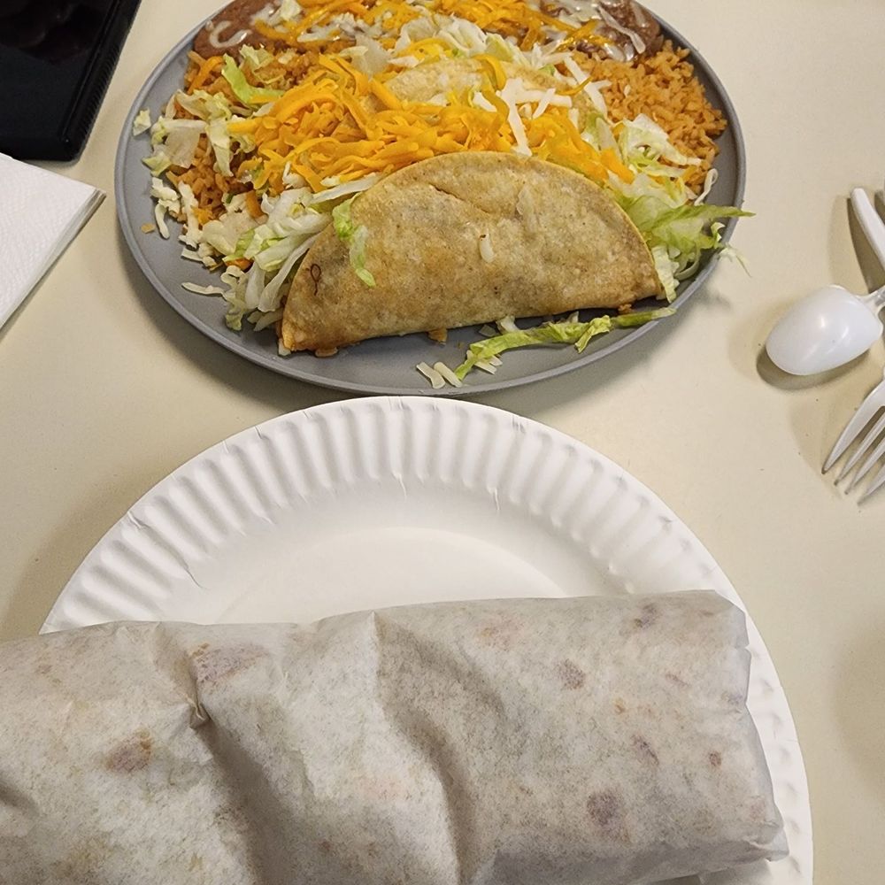 Bean burrito and two taco plate Bean burrito and two taco plate