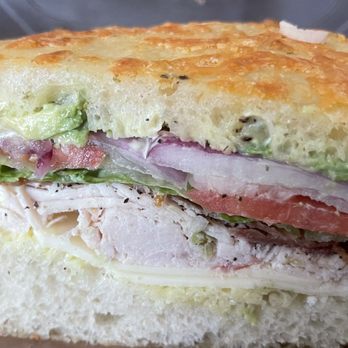 Kneaders Bakery Cafe - Fresh carved turkey, provolone, mayo, tomatoes, dark, green lettuce, Avacado chunks and thick freaking delicious bread. - Bakeries Near Me - Orem, Utah