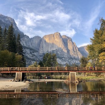 Swinging Bridge - The Swinging Bridge and its reflection in the water below. - Local Flavor Near Me