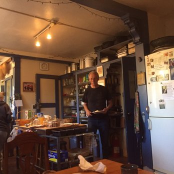 Black Range Lodge - Charles serving breakfast in the beautiful historic lodge. - Hotels Near Me - Kingston, New Mexico