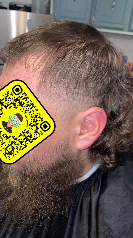 Haircuts by Moe Logo