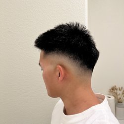 The Firm Barbershop - Haircut by Sergio - Mid high fade with textured top