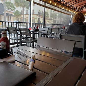 Amerikanos Grille - Dining outside in the cold.  Brrr. - Mediterranean Near Me - Lady Lake, Florida