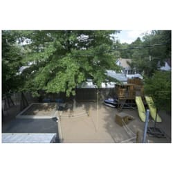 Ackermann's Swim Program - Part of the sand playground.