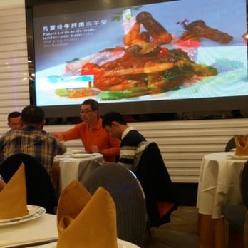 Chef Tony - Large TV screen wall featuring dishes. - Dim Sum Near Me - Richmond, British Columbia Chef Tony - Large TV screen wall featuring dishes. - Dim Sum Near Me - Richmond, British Columbia