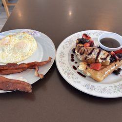 Tiffy Jo's Diner & Energy Bar - Berries and Cream Cheese French Toast. For the sides it's two eggs over easy and bacon