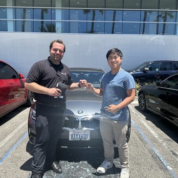 Irvine BMW - Moe (in black) was super patient and knowledgeable. He was great with our son. This has been the best experience! - Car Dealers Near Me - Irvine, California