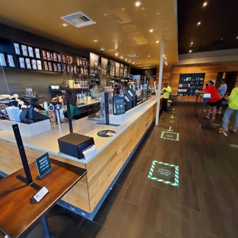 Starbucks - The inside of the coffee shop. Very fast service! Quality drinks! - Coffee & Tea Near Me - Honolulu, Hawaii