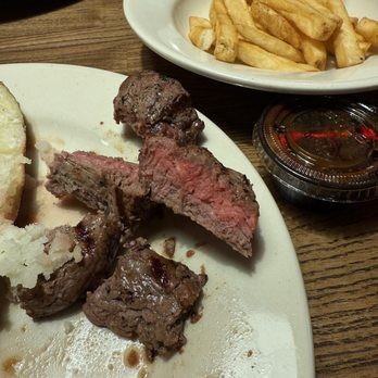 Logan's Roadhouse - Not cooked steak - Steakhouses Near Me - Roseville, Michigan