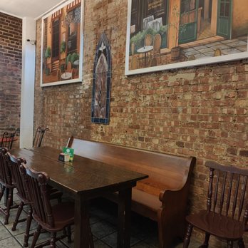 Sisters Cafe & Gifts - a table and chairs - Cafes Near Me - Marion, Virginia