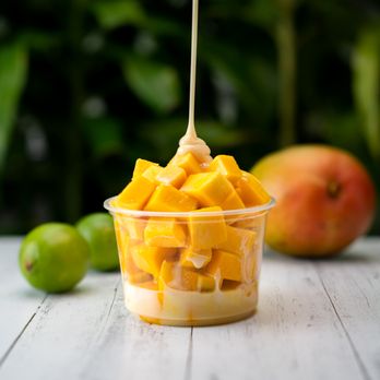 Happy Mango - a bowl of fruit with a spoon - Juice Bars & Smoothies Near Me - Clearwater, Florida Happy Mango - a bowl of fruit with a spoon - Juice Bars & Smoothies Near Me - Clearwater, Florida