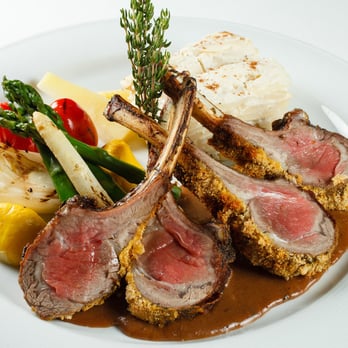 Chez Boet - Dijon mustard/herbes de Provence crusted rack of lamb is grilled to order - French Near Me - Naples, Florida