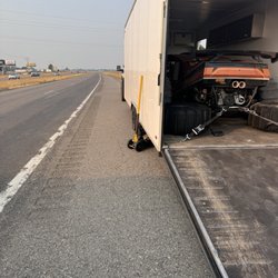 Les Schwab Tire Center - Enclosed trailer traveling through