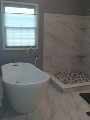 Bathroom Remodel - This Bathroom project was a complete redesign, we removed existing walls, electric and plumbing to enlarge for a new Master Bathroom. Bathroom Remodel - This Bathroom project was a complete redesign, we removed existing walls, electric and plumbing to enlarge for a new Master Bathroom.