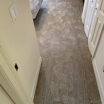 Flooring Solution Services - view of a bedroom from the hallway - Flooring Near Me Flooring Solution Services - view of a bedroom from the hallway - Flooring Near Me