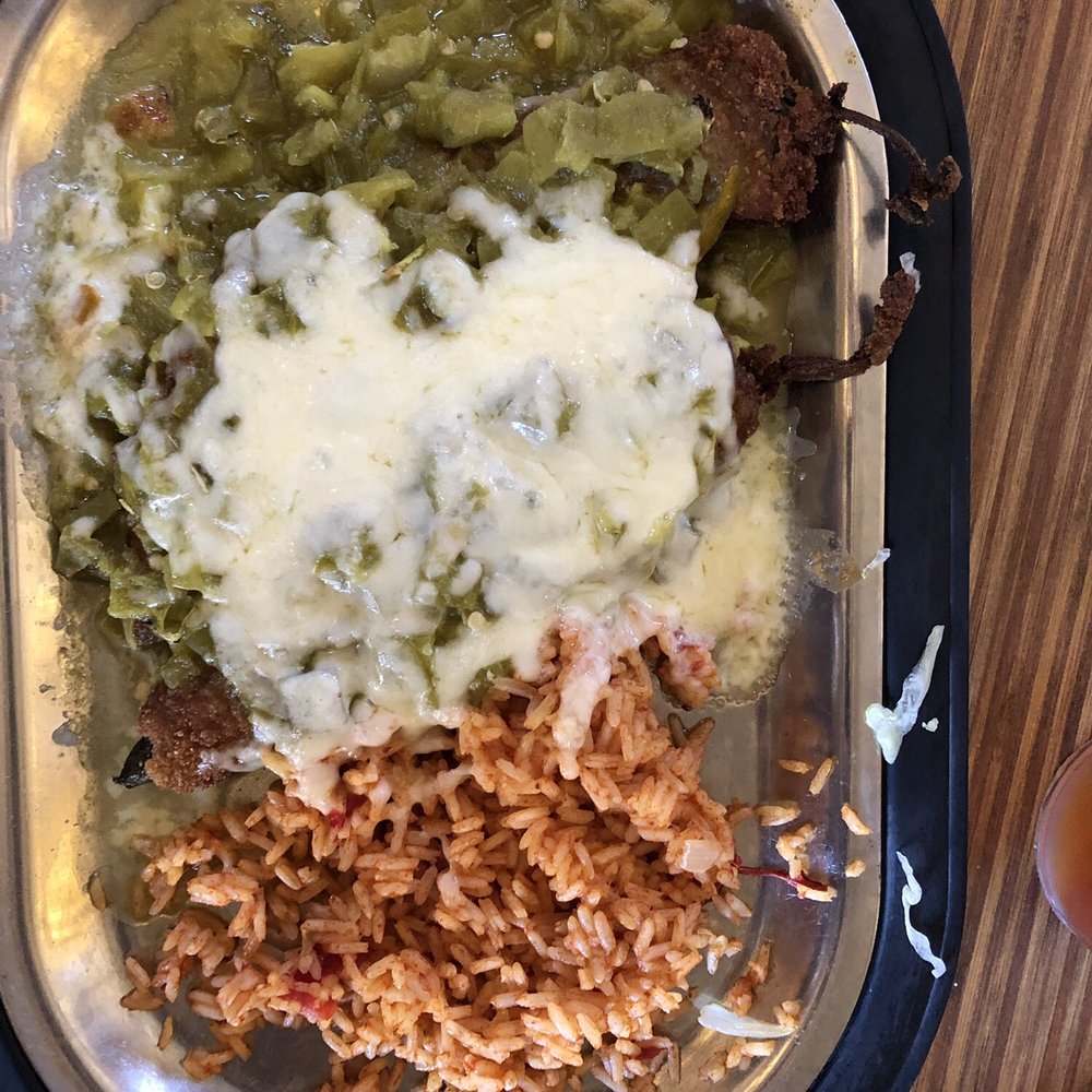 Tomasita's - The overly spicy chili rellenos and the dried out excuse of Mexican rice. - New Mexican Cuisine Near Me - Santa Fe, New Mexico Tomasita's - The overly spicy chili rellenos and the dried out excuse of Mexican rice. - New Mexican Cuisine Near Me - Santa Fe, New Mexico