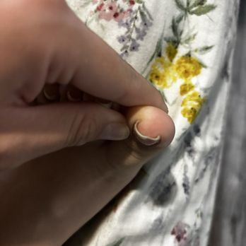 Classy Nails - the dent from the top, it looks worse in person and you can even feel how deep the dent is. - Nail Salons Near Me - West Jordan, Utah