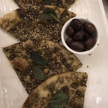 Zatar - Zatar pie - thyme, sesame, sumac, and olive oil - Lebanese Near Me - Dallas, Texas Zatar - Zatar pie - thyme, sesame, sumac, and olive oil - Lebanese Near Me - Dallas, Texas