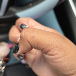 Shine A Nail Boutique - Gel polish left on my hand.