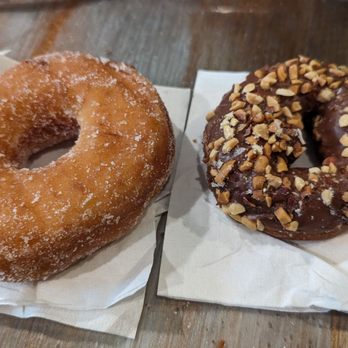 Happy Donuts - Sugar raised donut and chocolate peanut cake donut - Donuts Near Me - Puyallup, Washington Happy Donuts - Sugar raised donut and chocolate peanut cake donut - Donuts Near Me - Puyallup, Washington