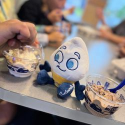 Culver's - Scoopie and kid scoops of ice cream