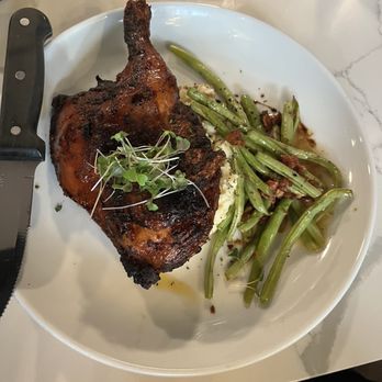 The Emory Bar & Kitchen - Roasted chicken on bed of mashed potato's with green beans - Wine Bars Near Me - Waxahachie, Texas The Emory Bar & Kitchen - Roasted chicken on bed of mashed potato's with green beans - Wine Bars Near Me - Waxahachie, Texas