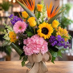 Riverview Florist - Brighten Someone's Day with a Stunning Tropical Bouquet!
Make every occasion unforgettable with this vibrant handcrafted arrangement