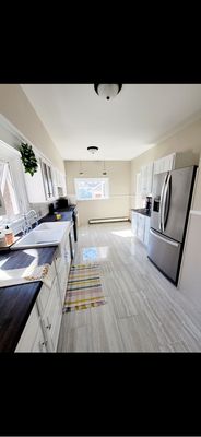 Kitchen Remodel - What makes this transformation unique is the balance between innovation and tradition. Instead of overhauling everything, we focused on enhancing what was already there — saving the client time and money while achieving a high-end result.
From the fresh white cabinets and durable porcelain flooring to the natural butcher block countertops and new appliance upgrades, every choice was intentional, blending modern design with timeless comfort. Kitchen Remodel - What makes this transformation unique is the balance between innovation and tradition. Instead of overhauling everything, we focused on enhancing what was already there — saving the client time and money while achieving a high-end result.
From the fresh white cabinets and durable porcelain flooring to the natural butcher block countertops and new appliance upgrades, every choice was intentional, blending modern design with timeless comfort.