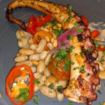 151 Kitchen | Bar - Grilled octopus with white bean salad and roasted tomatoes, nicely charred and cooked to perfection - Cocktail Bars Near Me - Elmhurst, Illinois 151 Kitchen | Bar - Grilled octopus with white bean salad and roasted tomatoes, nicely charred and cooked to perfection - Cocktail Bars Near Me - Elmhurst, Illinois