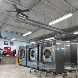 SuperMatt Laundry - $8.99 washing machines and front desk