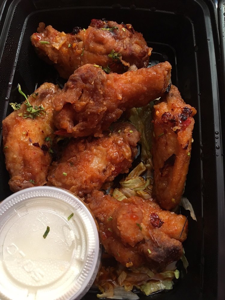 6 Pieces Wok Tossed Chicken Wings. Not that good. Very soggy and