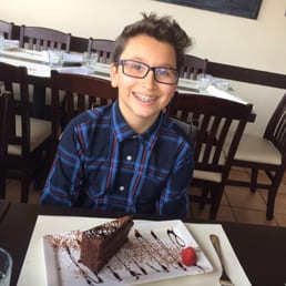 My son waiting to dig into his chocolate cake My son waiting to dig into his chocolate cake