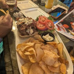 Black and blue burger with house made chips.