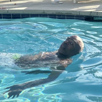 The New Inn - Husband taking a swim - Hotels Near Me - Temecula, California The New Inn - Husband taking a swim - Hotels Near Me - Temecula, California