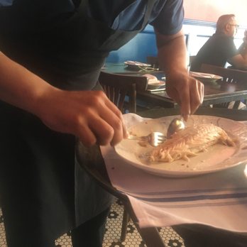 Positano Restaurant - Branzino being skinned - Italian Near Me - Brooklyn, New York