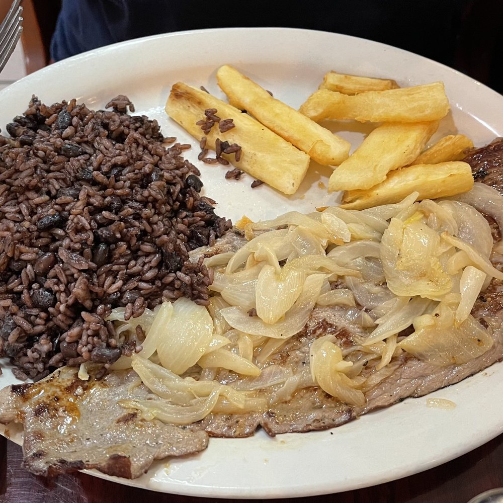 Coral Restaurant - a plate of food with beans and fries - Latin American Near Me - Miami, Florida Coral Restaurant - a plate of food with beans and fries - Latin American Near Me - Miami, Florida