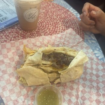 Buenos Días Cafe - No crema, avocado, or bacon in my husband's Asada & Bacon "loaded" breakfast burrito. - Cafes Near Me - Norco, California Buenos Días Cafe - No crema, avocado, or bacon in my husband's Asada & Bacon "loaded" breakfast burrito. - Cafes Near Me - Norco, California