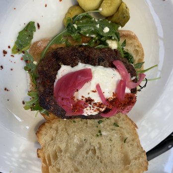 Monti's - Grilled Lamb Burger , Arugula , Feta Cheese , Cucumber Tzatziki Sandwich - Mediterranean Near Me - Santa Rosa, California Monti's - Grilled Lamb Burger , Arugula , Feta Cheese , Cucumber Tzatziki Sandwich - Mediterranean Near Me - Santa Rosa, California
