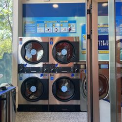 Repsol - Laundromat inside the gas station.