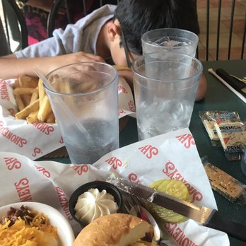 Shoney's - Fig. 1: appetizing grilled chicken sandwich meal and a sleeping child - Desserts Near Me - Morgan City, Louisiana