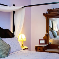 Schoolhouse Bed & Breakfast - Dick and Jane King room with canopy bed,' his and hers' shower, 2 person jetted tub.