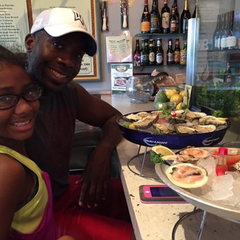 Tin Fish - My babies loves raw oysters and clams! - New American Near Me - Sunrise, Florida